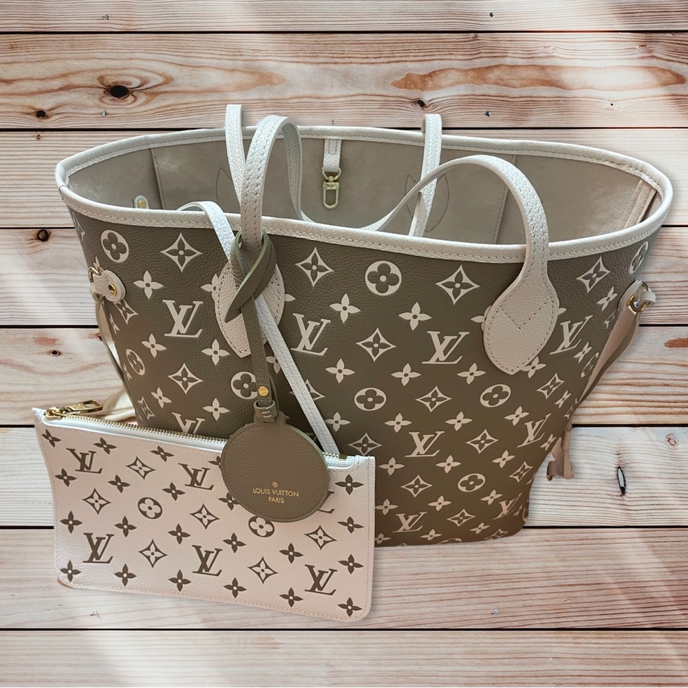 Limited Edition Louis Vuitton Spring 2022 
Monogram Empreinte Neverfull MM